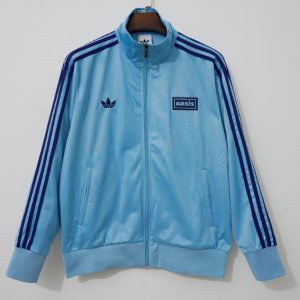 Oasis UK 2025-26 Chaqueta Camiseta